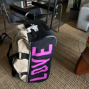 PINK Victoria’s Secret Rolling Luggage